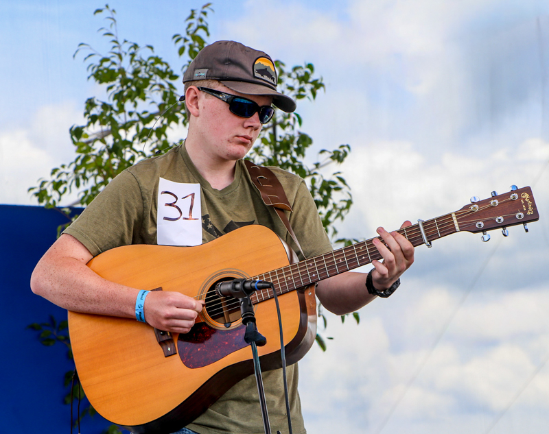 Mason Blevins in Youth Guitar competitition  at the 2026 Abingdon Fiddlers' Convention - photo © G. Nicholas Hancock