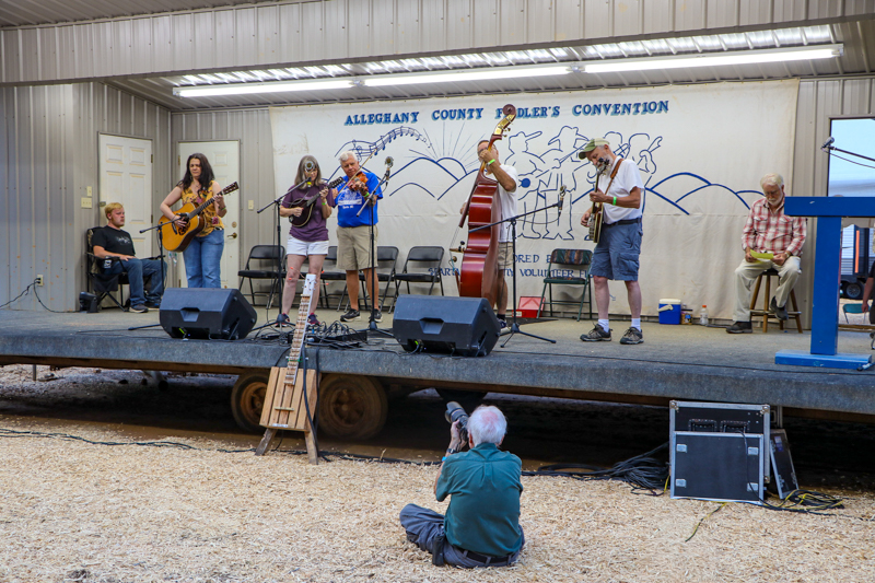 Photographer Mark Sanderford at the 2026 Alleghany County Fiddlers' Convention - photo © G. Nicholas Hancock