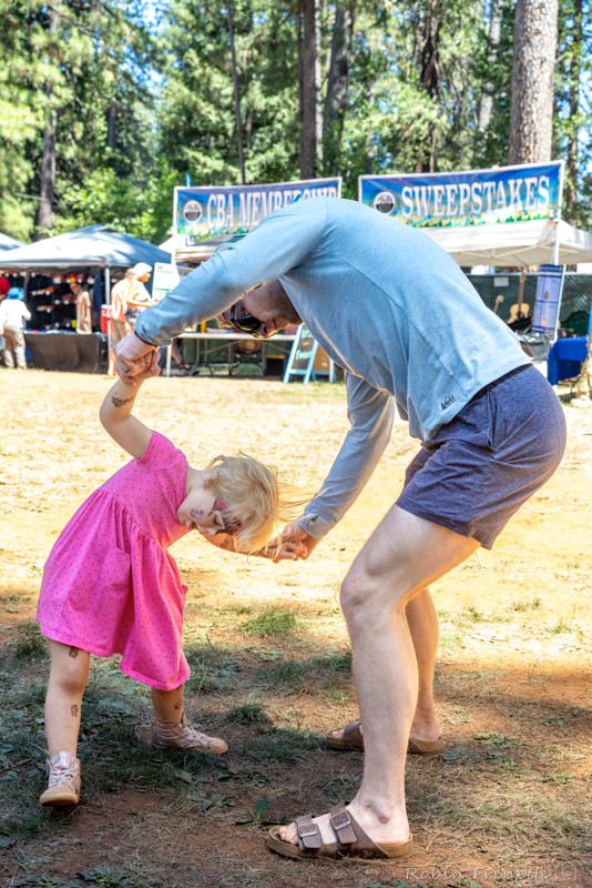 Dancing with dad at the 2026 CBA Father's Day Bluegrass Festival - photo © Robin Frenette