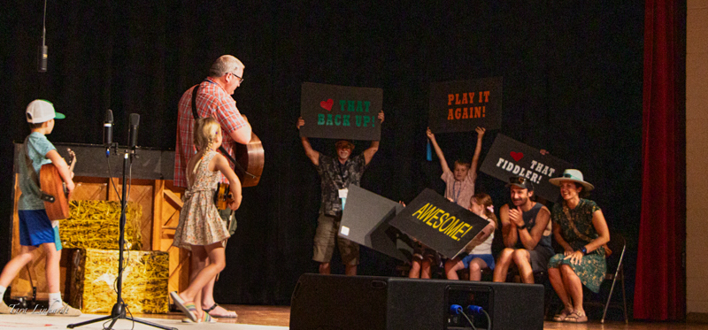 Small Fry Contestant walking off stage at the 2026 National Oldtime Fiddlers' Contest & Festival - photo © Tara Linhardt