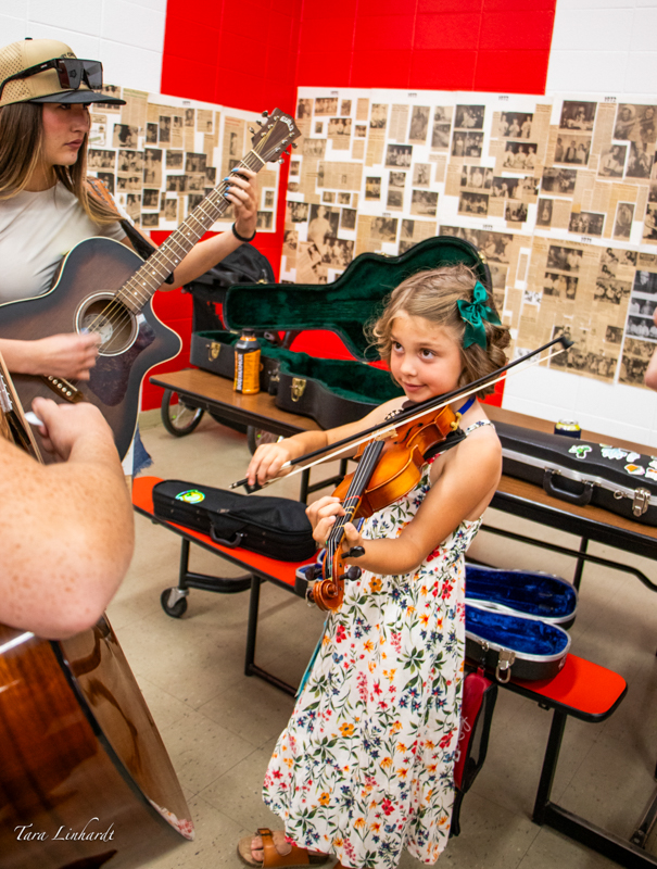 Small Fry Contestant warming up before contest at the 2026 National Oldtime Fiddlers' Contest & Festival - photo © Tara Linhardt