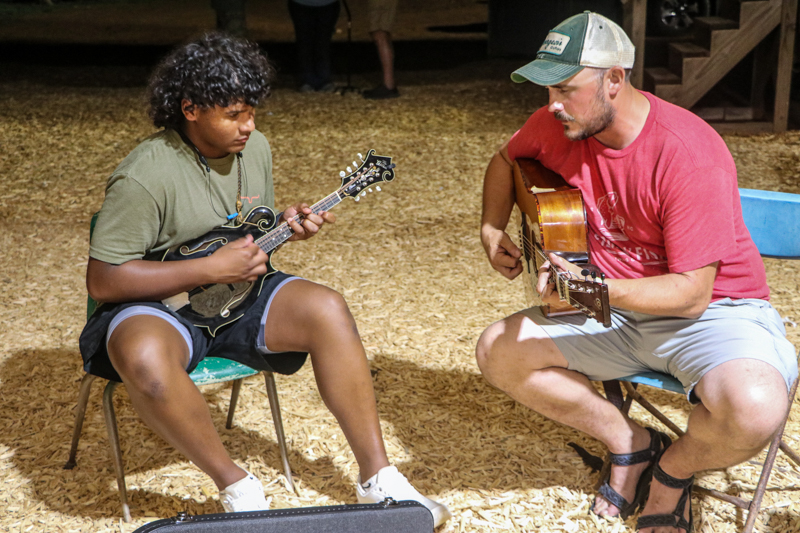 Tae Childress and Tommy Chandler jam backstage at the 2026 Alleghany County Fiddlers' Convention - photo © G. Nicholas Hancock