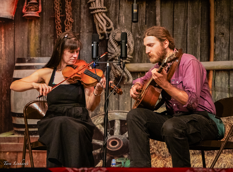 Tashina Clarridge Lindley and Orin Lindley performed between contests at the 2026 National Oldtime Fiddlers' Contest & Festival - photo © Tara Linhardt