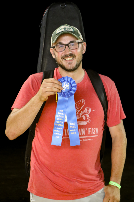 Tommy Chandler, 1st Place Guitar at the 2026 Alleghany County Fiddlers' Convention - photo © G. Nicholas Hancock