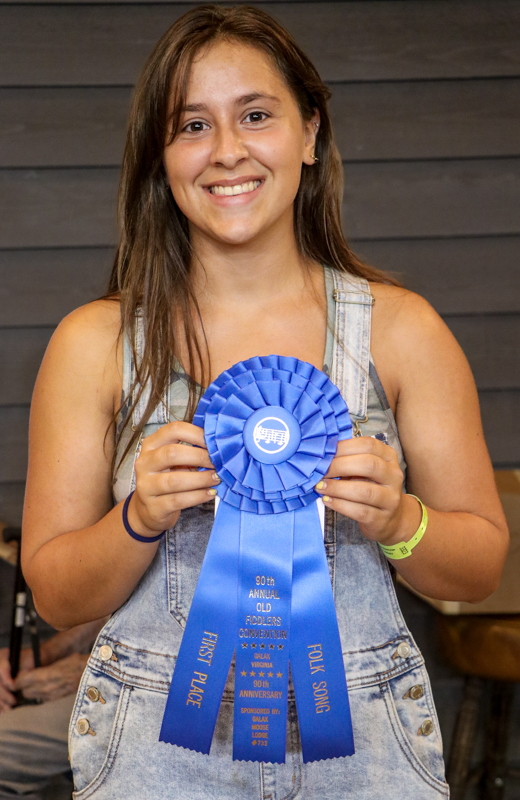 AnnMari Trakimowicz, 1st Place Folksong at the 2026 Old Fiddlers’ Convention – photo © G Nicholas Hancock