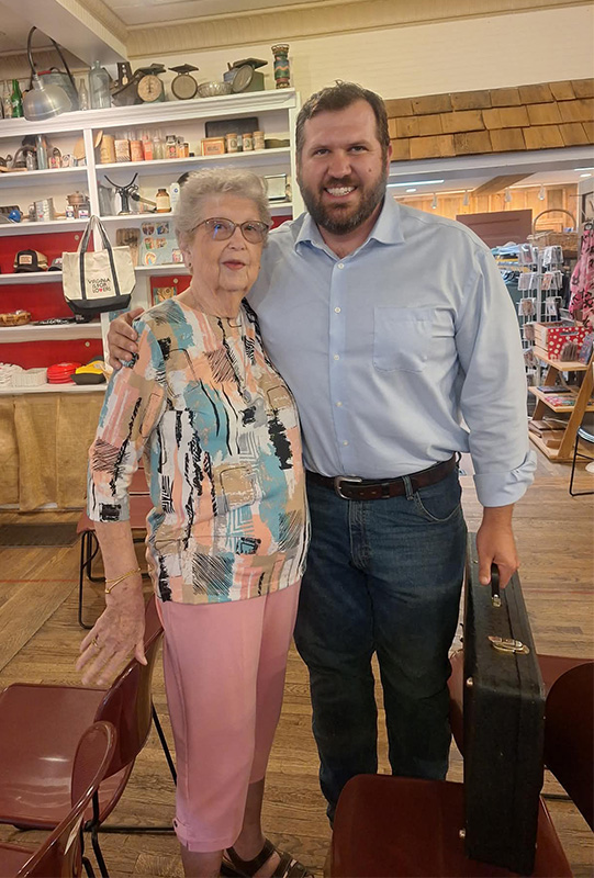 Joyce Sizemore, Herschel's widow, with Herschel's former student Spencer Blankenship at The Floyd Country Store August 22, 2026