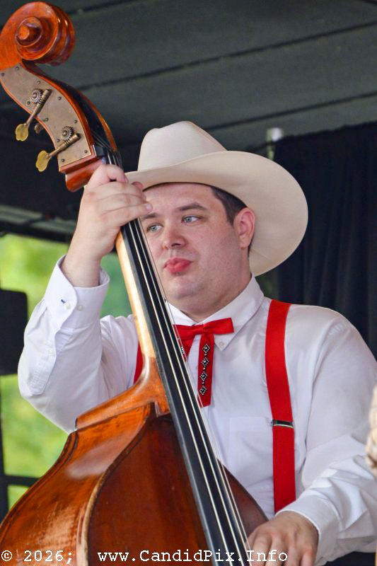 Adam Burrows with Merle Johnson & Friends at the 2026 North Carolina State Bluegrass Festival - photo © Bill Warren
