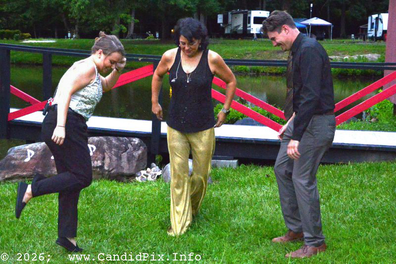 The “MLH” dancers – Molly Yates, Lizzy Long, and Holger Oleson at the 2026 North Carolina State Bluegrass Festival - photo © Bill Warren