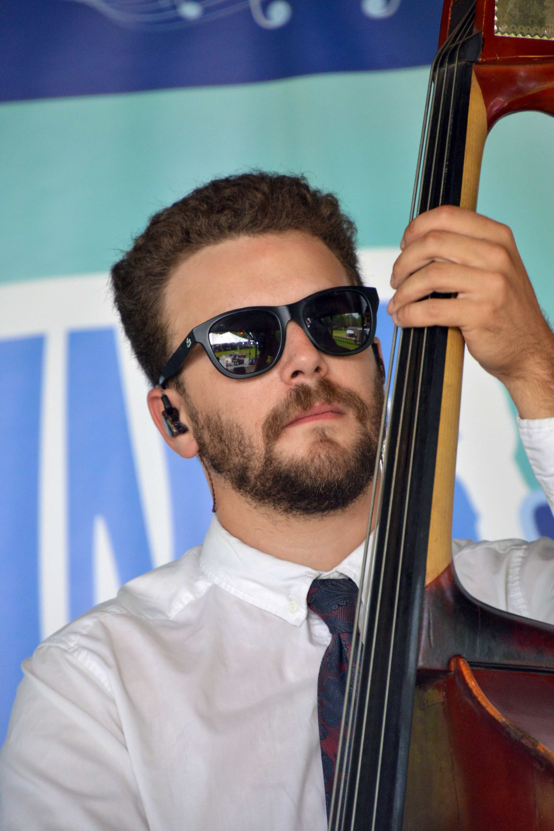 Gabriel Hebert with Junior Sisk & Ramblers Choice at the 2026 North Carolina State Bluegrass Festival - photo © Bill Warren