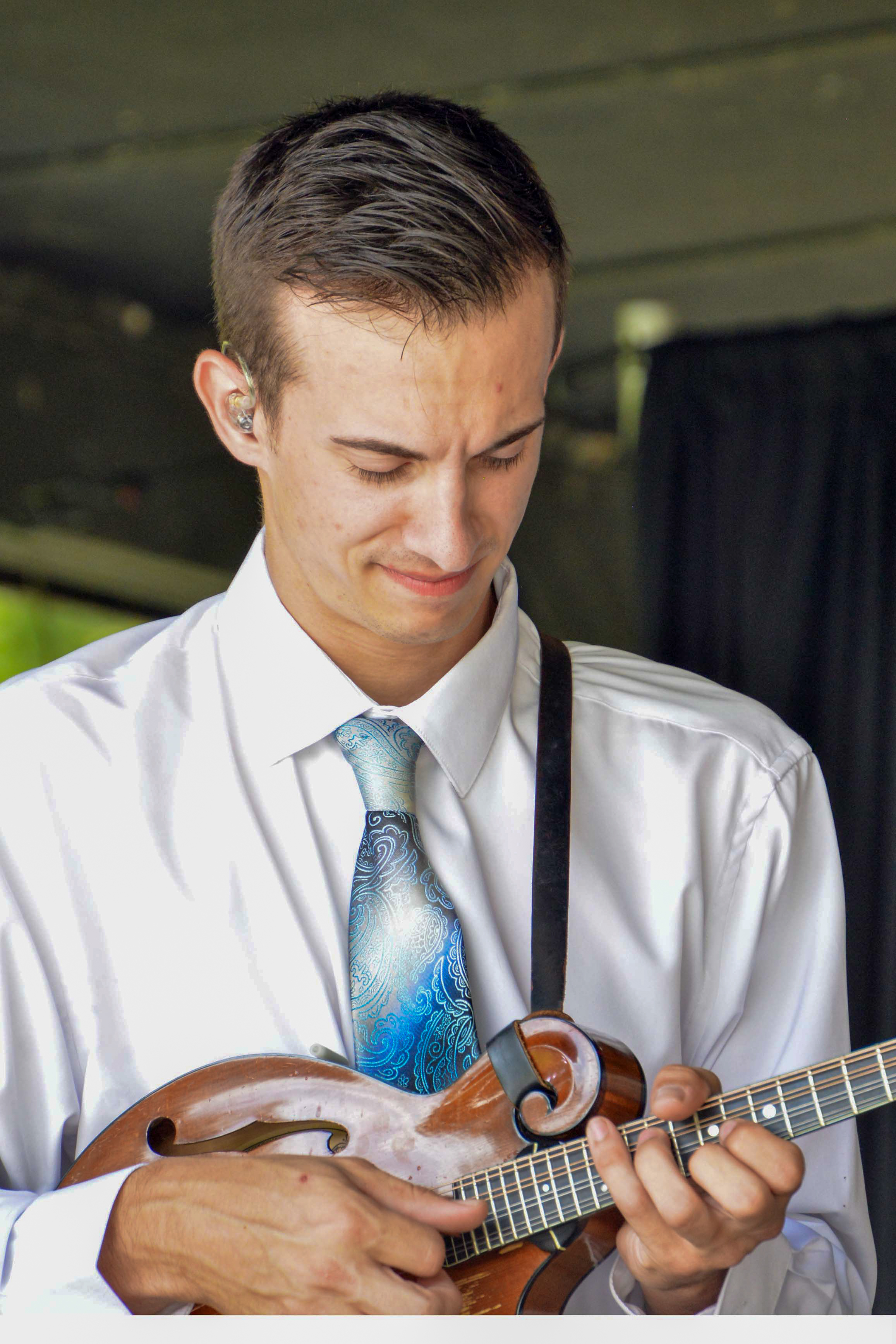 Sam Zolla with Junior Sisk & Ramblers Choice at the 2026 North Carolina State Bluegrass Festival - photo © Bill Warren