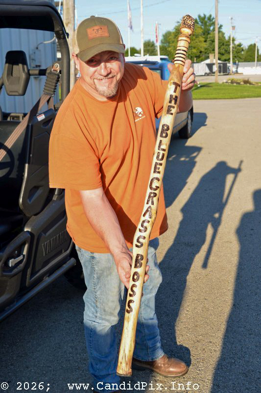 Edgar Loudermilk with his new walking stick at the 2026 Brown County Bluegrass Festival - photo © Bill Warren