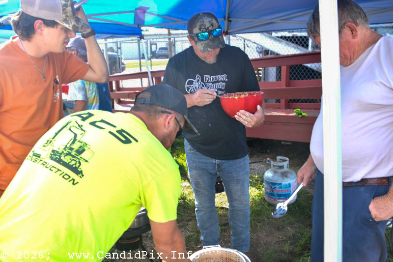Edgar Loudermilk frying up hushpuppies and fish for Edgar's Fish Fry at the Brown County Bluegrass Festival - photo © Bill Warren