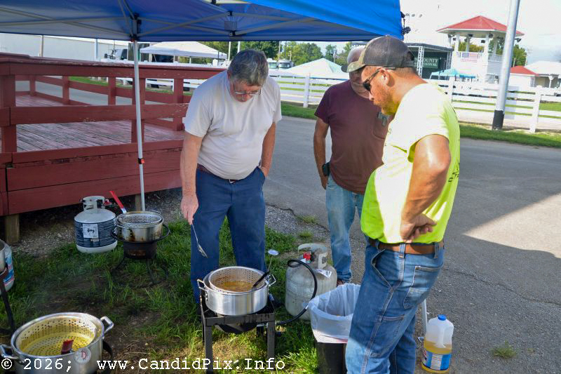 Frying up hushpuppies and fish for Edgar's Fish Fry at the Brown County Bluegrass Festival - photo © Bill Warren