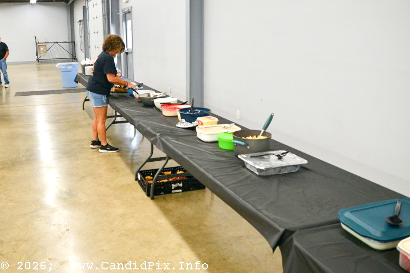 Laying out the food for Edgar's Fish Fry at the Brown County Bluegrass Festival - photo © Bill Warren