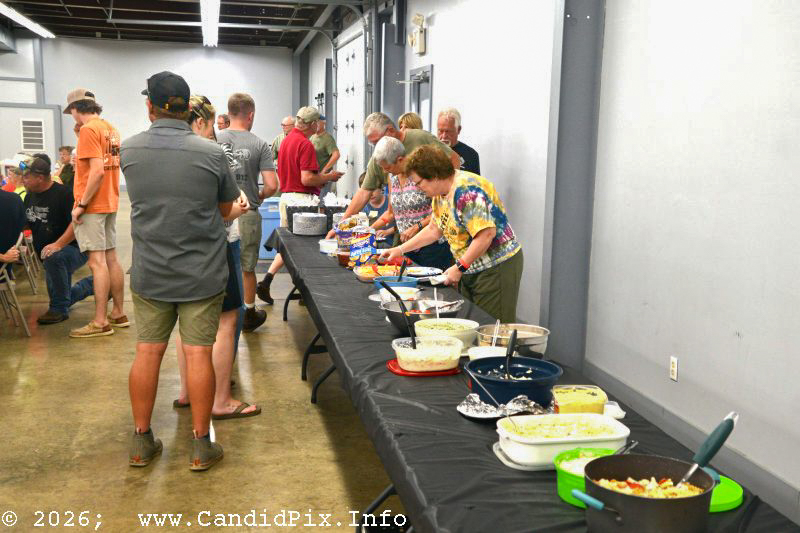 Serving up grub for Edgar's Fish Fry at the Brown County Bluegrass Festival - photo © Bill Warren