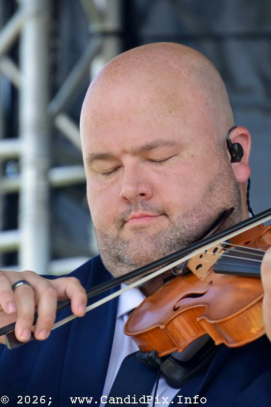 Mason Wright with Junior Sisk & Ramblers Choice at the 2026 Brown County Bluegrass Festival - photo © Bill Warren