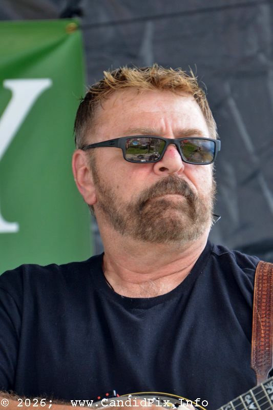 Ron Stewart with the Caleb Daugherty Band at the 2026 Brown County Bluegrass Festival - photo © Bill Warren