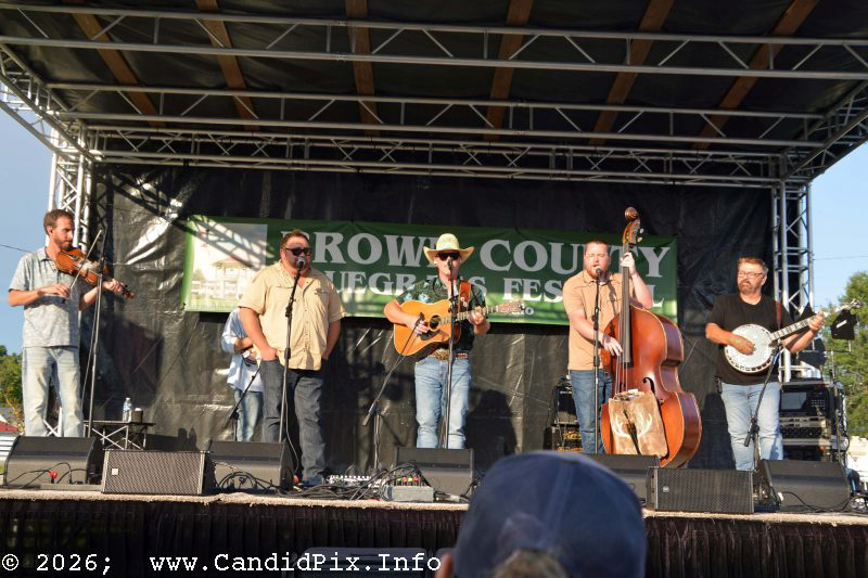 Eli Johnston sings one with The Caleb Daugherty Band at the 2026 Brown County Bluegrass Festival - photo © Bill Warren