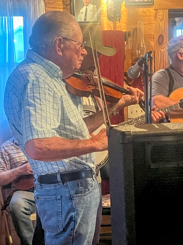 Junior Harris on fiddle at he and his wife's 60th anniversary celebration at their monthly jam - photo by Sandy Hatley