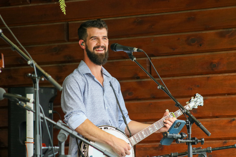 Daniel Norton with Darin & Brooke Aldridge at the 2026 Orange Army Bluegrass Festival - photo © Laura Tate Photography