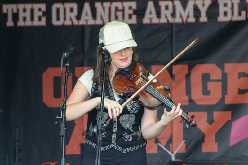 Marissa Coulter with Darin & Brooke Aldridge at the 2026 Orange Army Bluegrass Festival - photo © Laura Tate Photography