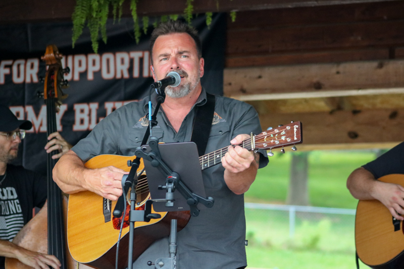 Tim Shelton with NewFound Road at the 2026 Orange Army Bluegrass Festival - photo © Laura Tate Photography