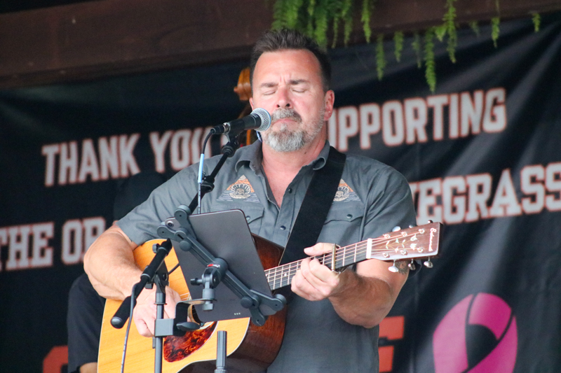 Tim Shelton with NewFound Road at the 2026 Orange Army Bluegrass Festival - photo © Laura Tate Photography
