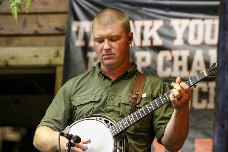 Chase Bennett with Hammertowne at the 2026 Orange Army Bluegrass Festival - photo © Laura Tate Photography