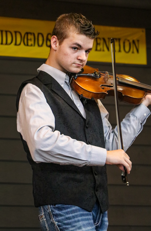 Malachi Ellenburg with The Big Ridge Ramblers at the 2026 Old Fiddlers’ Convention – photo © G. Nicholas Hancock