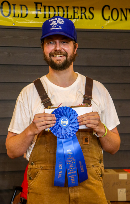 Mason Winfree, 1st Place Autoharp at the 2026 Old Fiddlers’ Convention – photo © G Nicholas Hancock