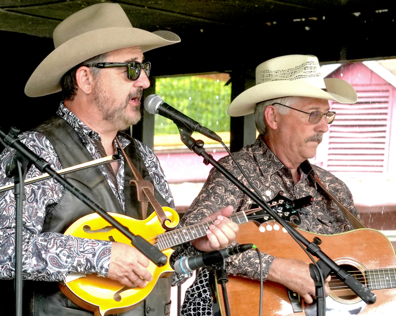 Kent Dixon and Allen Dyer with Lorraine Jordan & Country Grass at the 2026 North Carolina State Bluegrass Festival in Cherokee - photo © Jeff Lahr