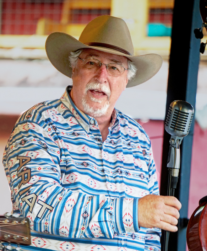 Alan Hicks with Garrett Newton & the Lovesick Drifters on Wednesday at the 2026 North Carolina State Bluegrass Festival - photo © Jeff Lahr