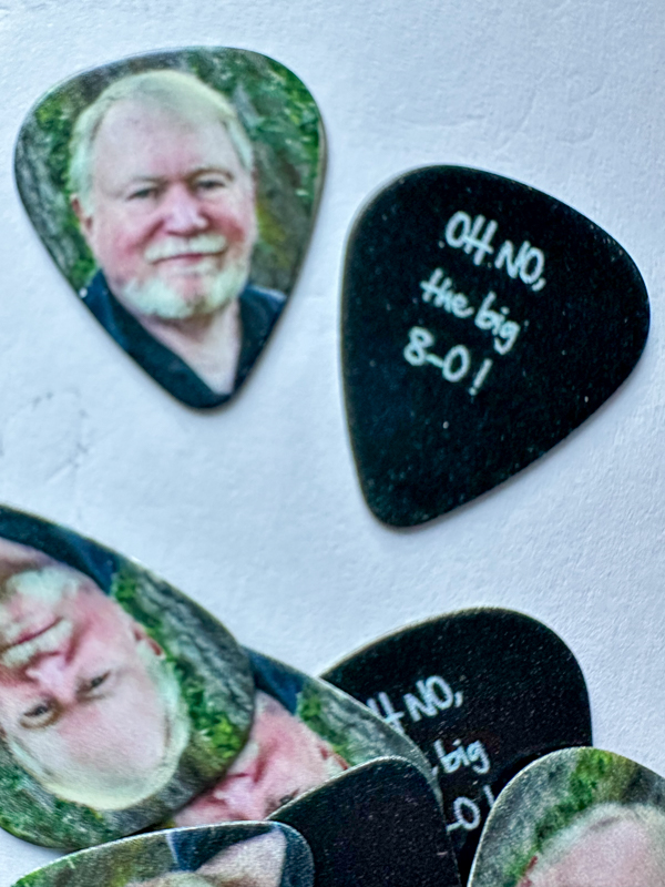 More fun party favors - one-of-a-kind commemorative picks at Bob Artis' 80th birthday celebration (7/26/26) - photo © Karen Artis