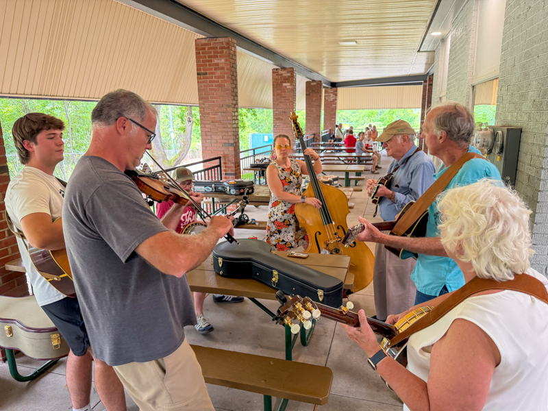 Trish Imbrogno on bass jammingBob Artis' his 80th birthday celebration (7/26/26) - photo © Karen Artis