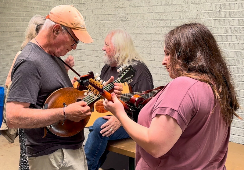 Alan Epstein pickin’ with Valerie Wood, little John Merle’s mom at Bob Artis' 80th birthday celebration (7/26/26) - photo © Karen Artis