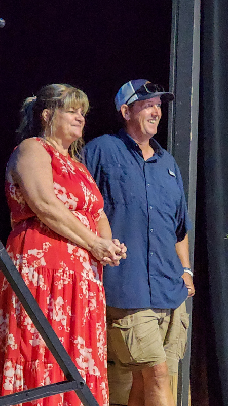 MC Cindy Baucom and promoter Cody Johnson at the 2026 Camp Springs Labor Blue Grass Festival - photo © Laura Tate Photography