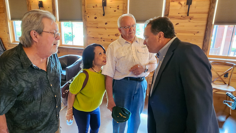Buddy Michaels and Larry Stephenson chat with friends at Allen Mills' Celebration of Life (9/20/26) - photo © Sandy Hatley