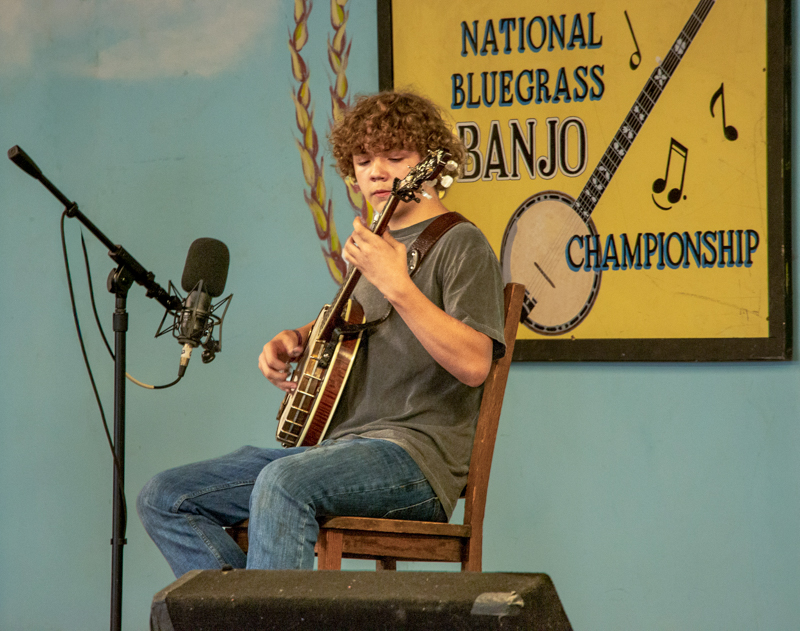 Alex Davis, 2nd place winner in the National Bluegrass Banjo Championship competition at the 2026 Walnut Valley Festival - photo by Keith Davis
