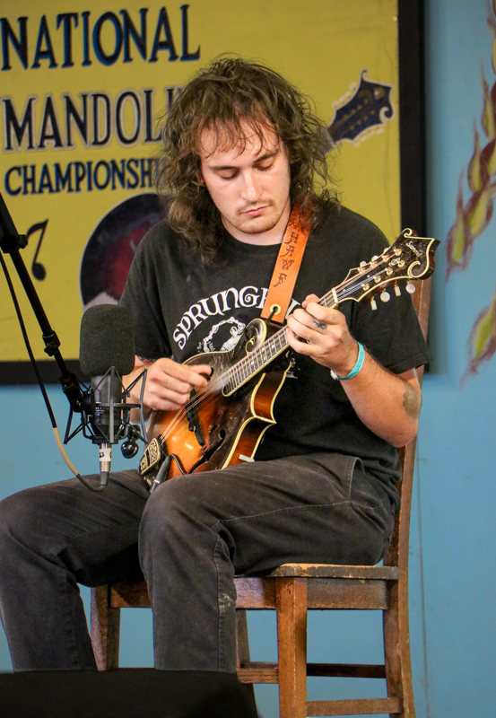 Alex Hawf in the mandolin competition at the 2026 Walnut Valley Festival - photo © G. Nicholas Hancock