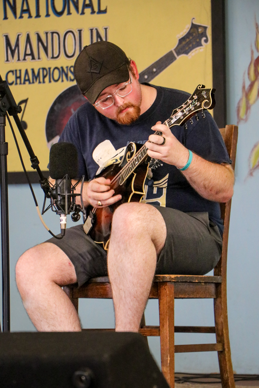 Anthony Howell in the National Mandolin competition at the 2026 Walnut Valley Festival - photo © G. Nicholas Hancock