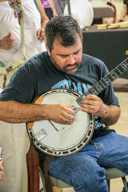 Brandon Green jamming at the 2026 Walnut Valley Festival - photo © G. Nicholas Hancock