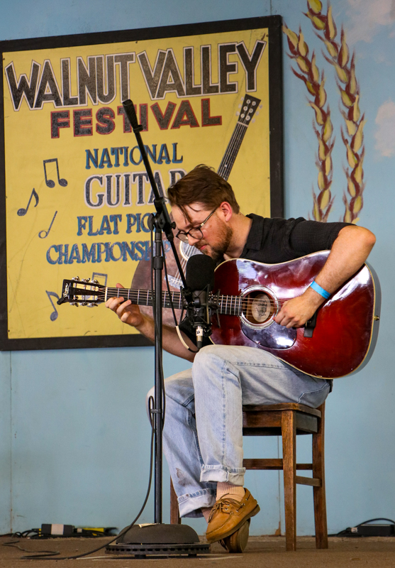 Dillon Hodges in the National Flat Pick Guitar competition at the 2026 Walnut Valley Festival - photo © G. Nicholas Hancock
