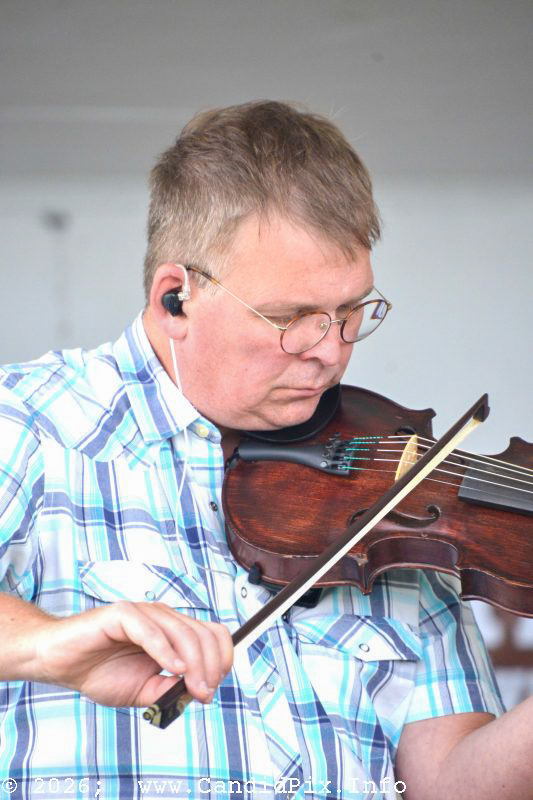 Chris Sexton with Nothin' Fancy at the debut Remington Ryde Reunion Bluegrass Festival - photo © Bill Warren