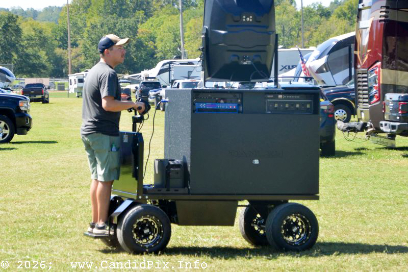 Caleb Cox takes the mobile sound system for a spin at the 2026 Nothin' Fancy Bluegrass Festival - photo © Bill Warren