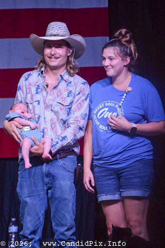 Jacob and Autumn Flick with their son, Jacob Jr, at the 2026 Nothin' Fancy Bluegrass Festival - photo © Bill Warren