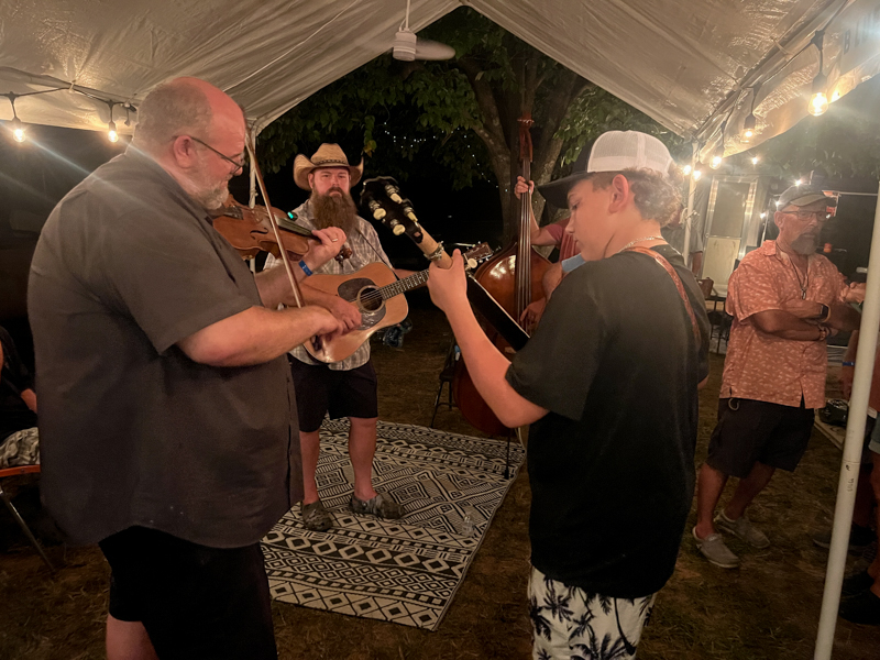 Night time jam at the 2026 Camp Springs Labor Day Blue Grass Festival - photo © Sandy Hatley