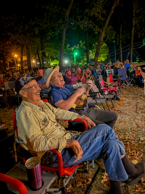 Darryl Webb with Appalachian Road Show entertains from the front row at the 2026 Starvy Creek Fall Bluegrass Festival - photo © Charlie Herbst