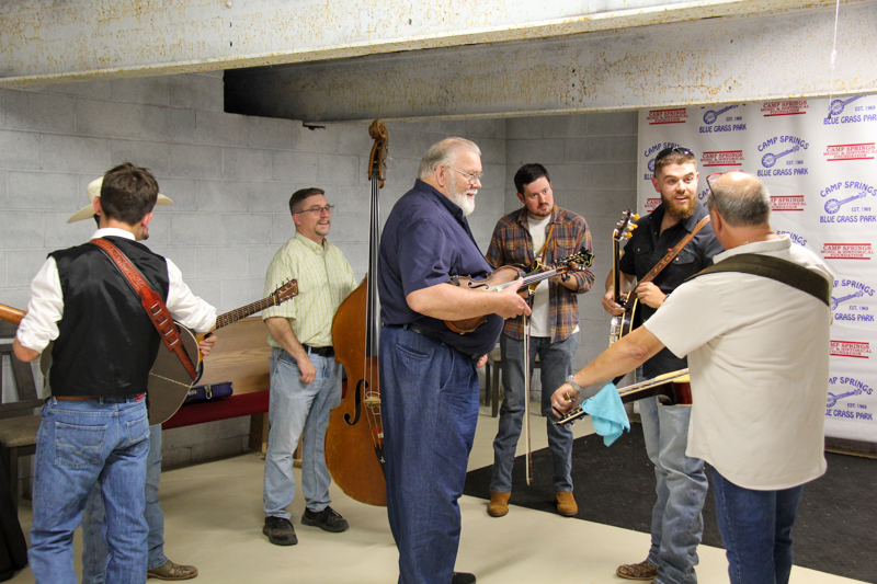 Camp Springs Bluegrass Band warming up backstage at the 2026 Camp Springs Labor Blue Grass Festival - photo © Laura Tate Photography