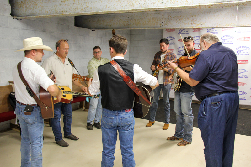 Camp Springs Bluegrass Band warming up backstage at the 2026 Camp Springs Labor Blue Grass Festival - photo © Laura Tate Photography