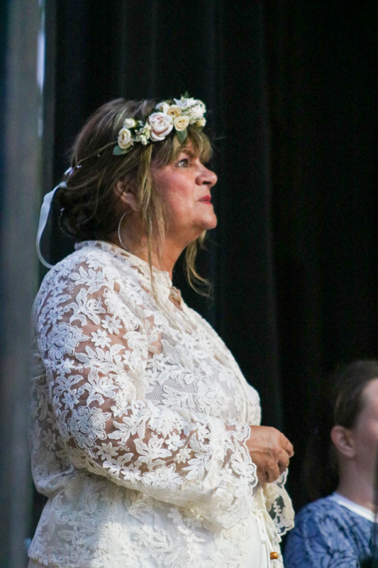 MC Cindy Baucom at the 2026 Camp Springs Labor Blue Grass Festival - photo © Laura Tate Photography